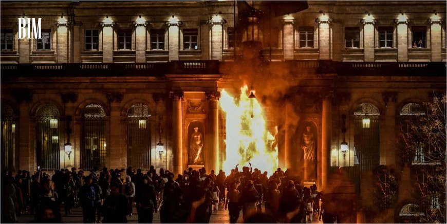 Fire is lit at the Bordeaux Town Hall during French pension demonstrations.